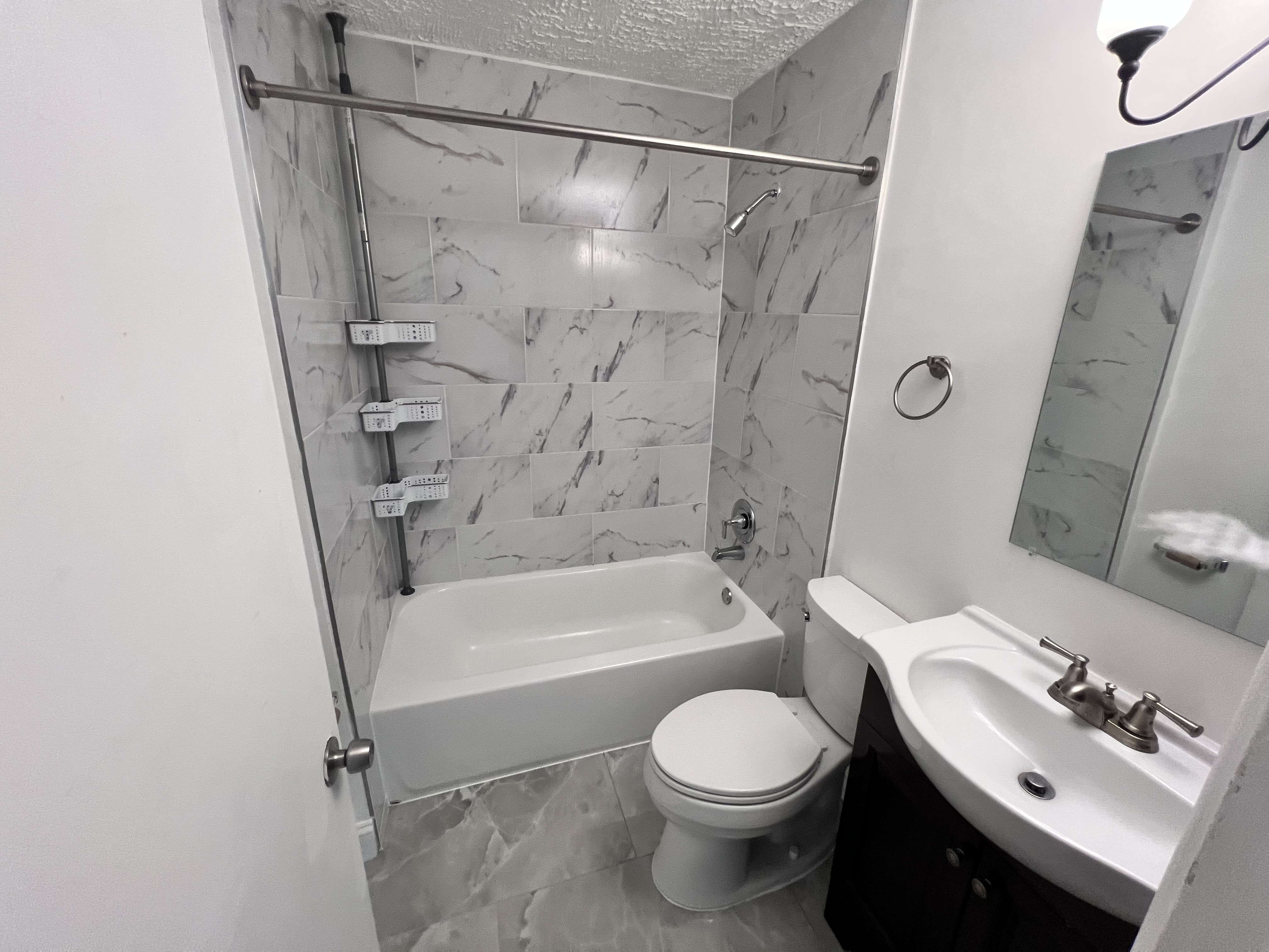 Marble tile bathroom after remodel