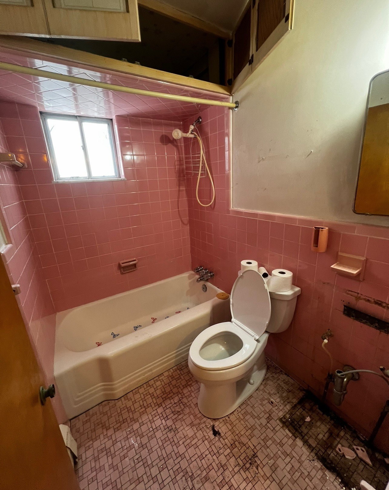 Pink tile bathroom before remodel